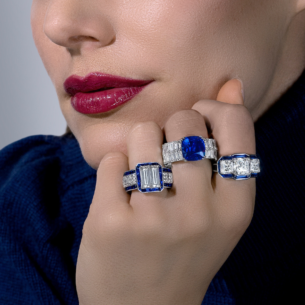 Clockwise from left to right – PICCHIOTTI Sapphire and Diamond Xpandable cocktail ring, PICCHIOTTI Xpandable cocktail ring with Cushion-Cut Sapphire and Emerald-Cut Diamonds, PICCHIOTTI Emerald-Cut Diamond and Buff Top Sapphire Xpandable cocktail ring